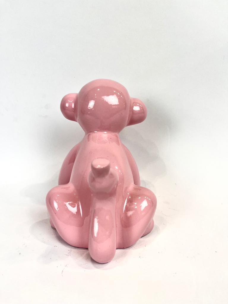 Scimmietta in resina rosa - Asmat Design